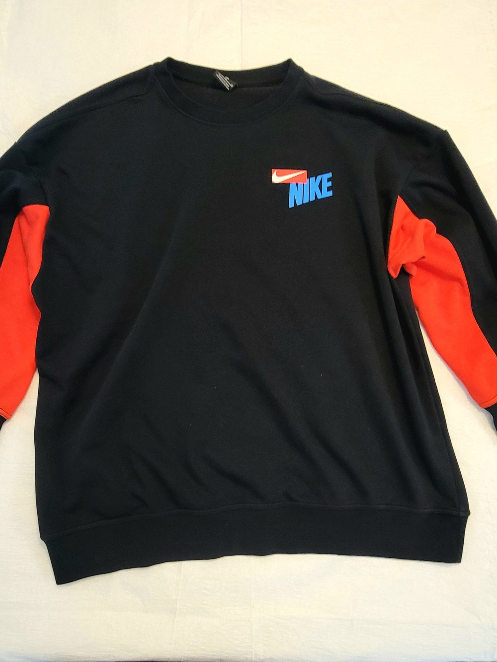 Nike Black Crewneck Sweater with Red Sleeves and Blue Logo